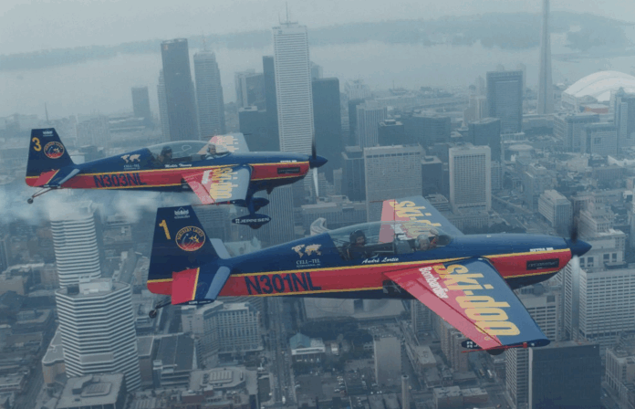 Mississauga mayor Hazel McCallion flying alongside the Northern Lights aerobatics squad downtown Toronto in 1995